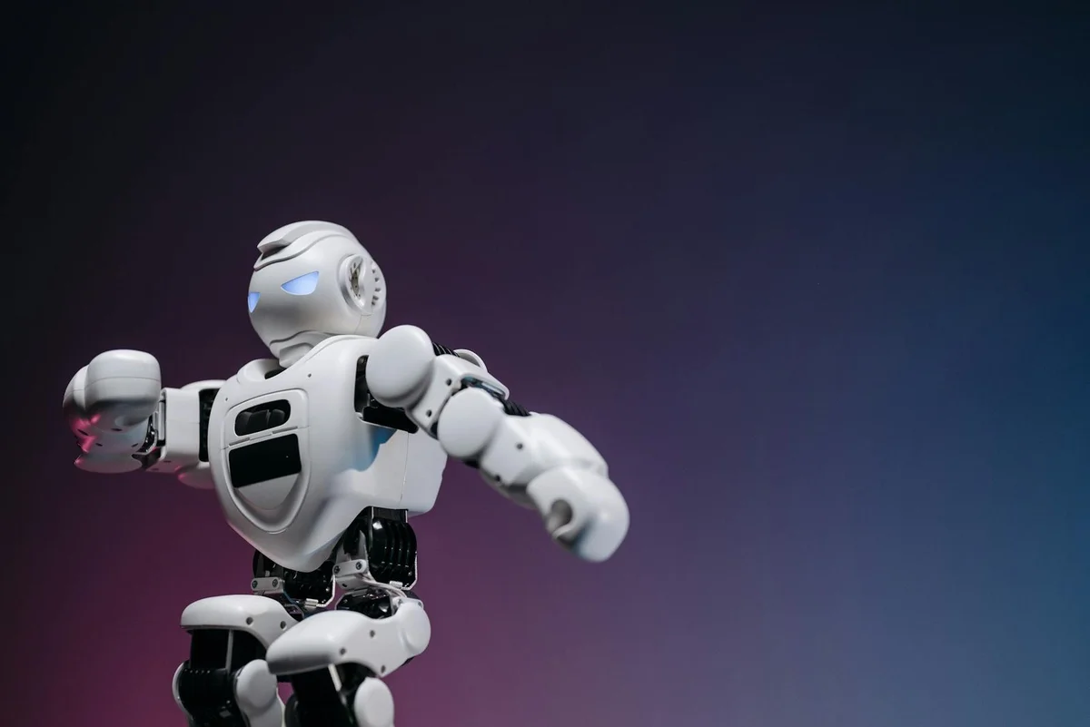 Close-up of a futuristic robotic toy against a gradient background, symbolizing